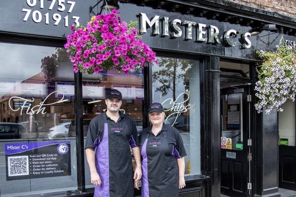 Dan and Amy outside Mister C's